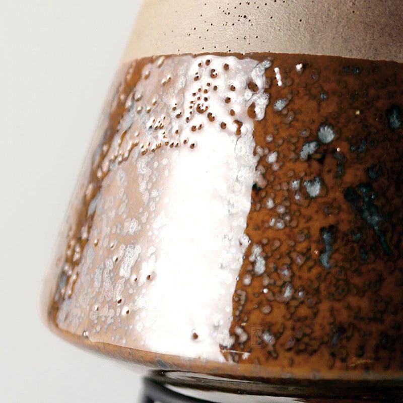 Pot en terre cuite en forme de goutte d'eau avec soucoupe intégrée