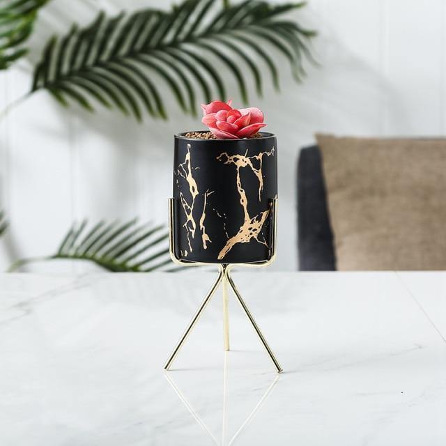 Jardinière de table en céramique marbrée avec support en métal géométrique